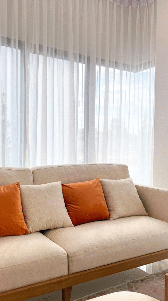 Step 1: Choosing a sofa as an anchor for warm modern living room ideas.