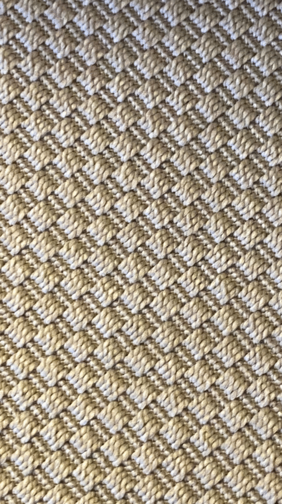 Layering slow textures like linen and wool in a sleep sanctuary.