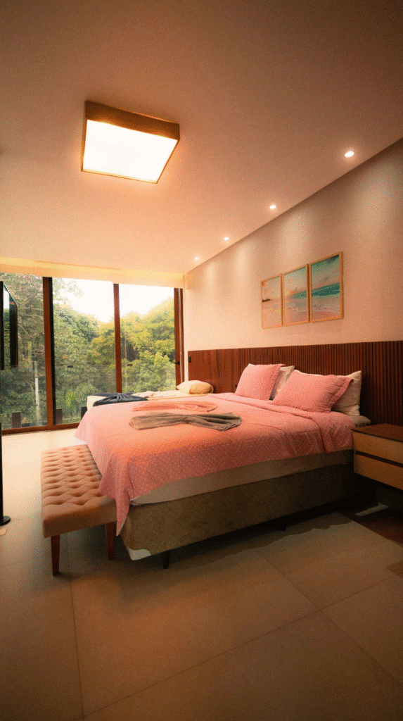 A serene warm neutral bedroom featuring layered textures, a linen duvet, and the viral cloud bed aesthetic.
